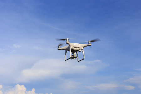 PHUKET, THAILAND - MAY 9 : Drone quadcopter Dji Phantom 4 Pro with 4K digital camera while flying over the sea in Phuket on May 9, 2017.のeditorial素材