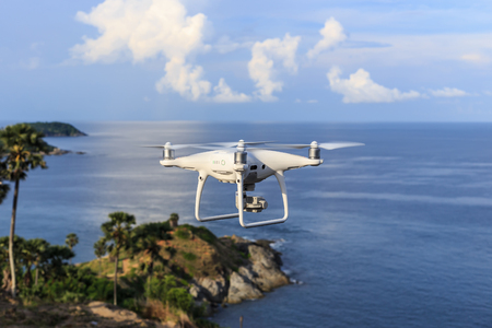 PHUKET, THAILAND - MAY 9 : Drone quadcopter Dji Phantom 4 Pro with 4K digital camera while flying over the sea in Phuket on May 9, 2017.のeditorial素材