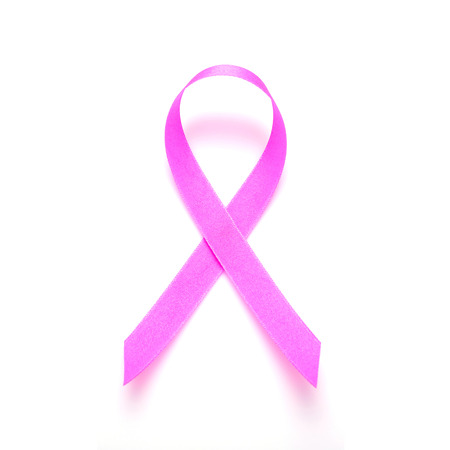 Breast Cancer concept : Pink ribbon symbol of breast cancer isolated on white backgroundの写真素材