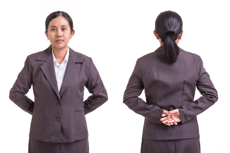 Portrait of businesswoman in grey suit isolated on white backgroundの写真素材