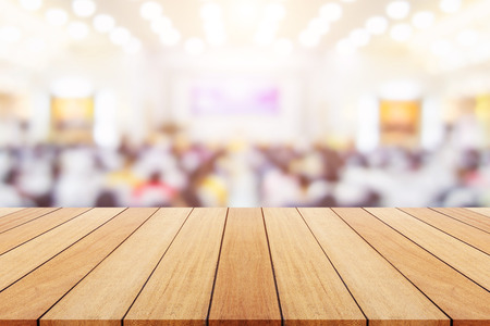 Empty wooden board or table and abstract blurred background. Free space can be used for photo...
