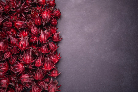 Pile of fresh red Roselle use for herb or food conceptの写真素材