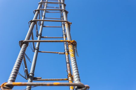 Rebar steel for pillar or pole in process of house building. Construction of reinforced concrete foundation beamの写真素材