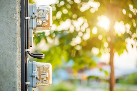 Thailand's electric meter. Electric meter installed on the pole to measurement watt in the houseの写真素材