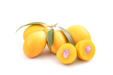Close up fresh yellow marian plum fruit (Mayongchid in Thai name) isolated on white background