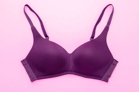 Top view new women bra on pink backgroundの写真素材