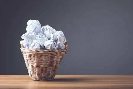 Thinking and creative the new inspiration concept, Pile crumpled paper on wooden table. Use for the idea of future creative innovation, Learning, Education or working, Studio shot.の写真素材