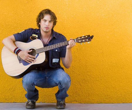 Male musician with guitar