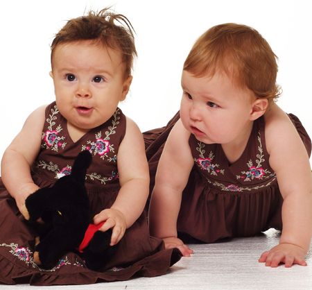  Two cute baby girl 's playingの写真素材