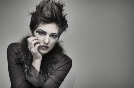 Beautiful fashion model with short hair and wild makeupの写真素材