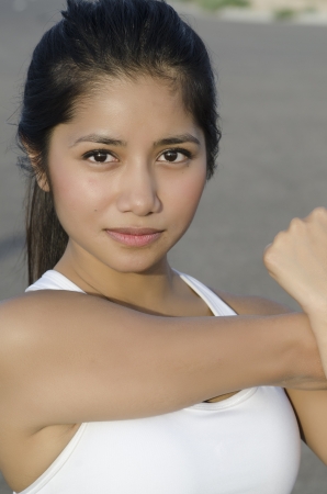 Woman stretching before exercising の写真素材