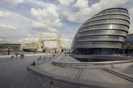London,England - May 11,2015 : View of City Hall, The building has an unusual, bulbous shape intended to reduce its surface area and thus improve energy efficiency.のeditorial素材
