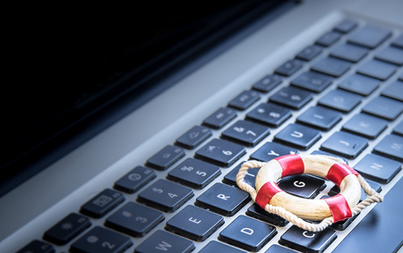 Life preserver icon on computer keyboard.の写真素材