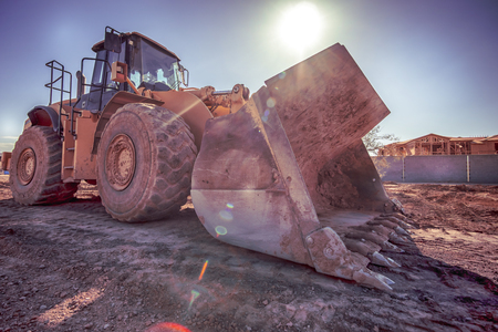 Bulldozer clearing ground for constructionの写真素材