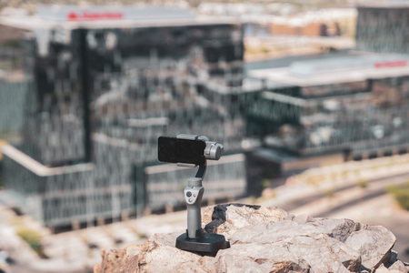 Tempe,Az,USA-5.2.18: DJI Osmo Mobile 2. DJI is a Chinese technology company. DJI revealed a new version of its popular gimbal at a much lower price for its handheld camera stabilizers At CES 2018.のeditorial素材