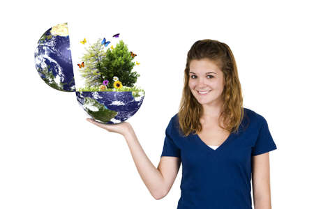 Young teenage girl holding an open Earthの写真素材