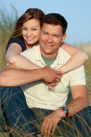 Attractive young loving couple outsideの写真素材