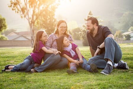 Happy family spending time in the parkの写真素材
