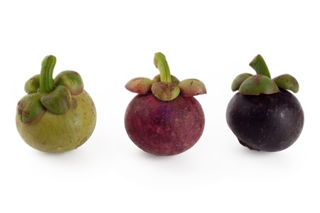 Mangosteens in three stages of ageingの写真素材
