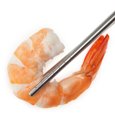 Shrimp with chopsticks isolated on white backgroundの写真素材