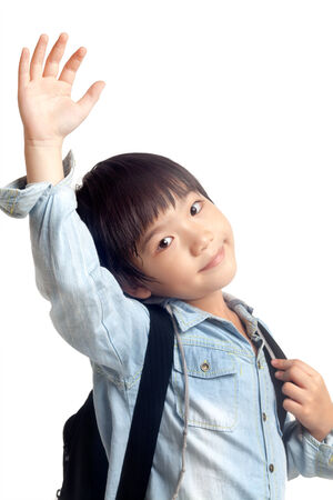 Happy school kid isolated on white backgroundの写真素材