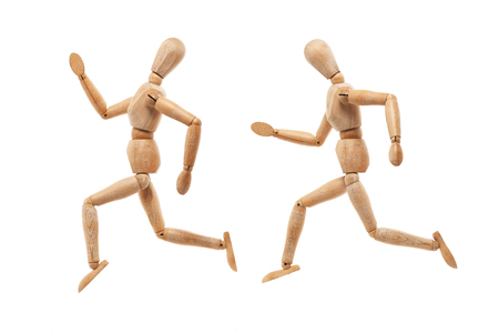 Wood men model with running away pose isolated on white backgroundの写真素材