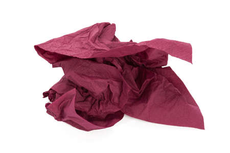Crumpled purple napkin paper isolated on white background