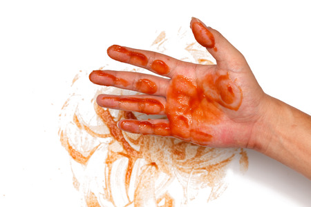 ketchup spill stain mucky hand drop white backgroundの写真素材