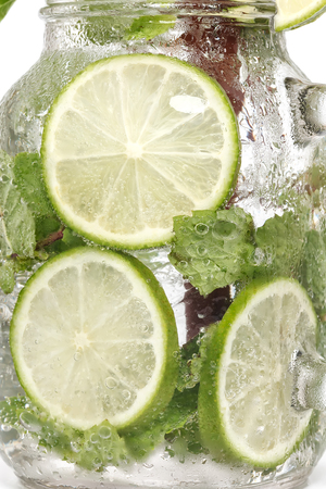 lime soda mint rosemary fresh drink summer refreshment isolatedの写真素材