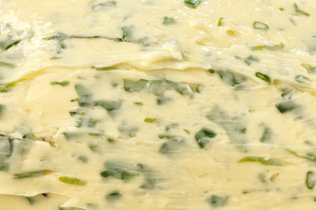 compound butter herb baguette thyme rosemary coriander oregano fresh chopped homemade food snack tastyの写真素材