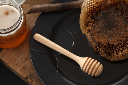 wood honey dipper soft cheese cake sweet pastries dessert yummy bakery rustic still life closeup delicious rustic backgroundの写真素材