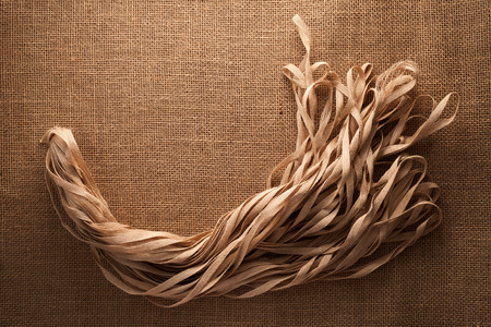 rope flax sackcloth background still life rustic flat layの写真素材