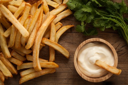 fries french sour cream herb still life close up rustic salt junk fastfood wood backgroundの写真素材