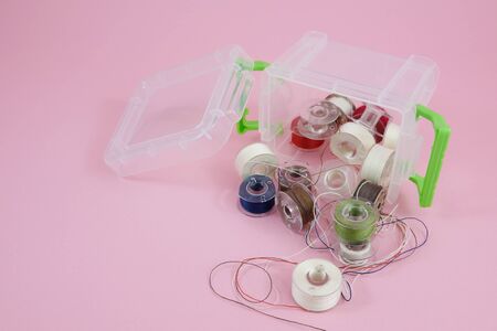 Thread spools in mini plastic box container. 2の写真素材