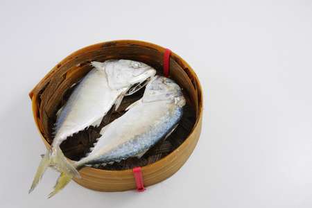 The fresh short mackerel fish in bamboo basket. 2の写真素材