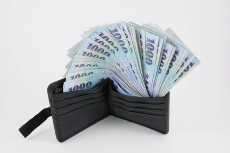 New Taiwan Dollar money in black wallet. 3の写真素材