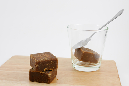The Taiwan brown sugar ginger tea cubes on the wooden board.の写真素材
