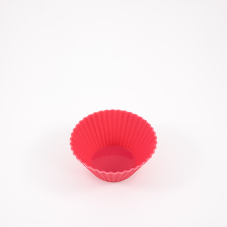 The pink silicone baking cup for make a cupcakes or muffins.の写真素材