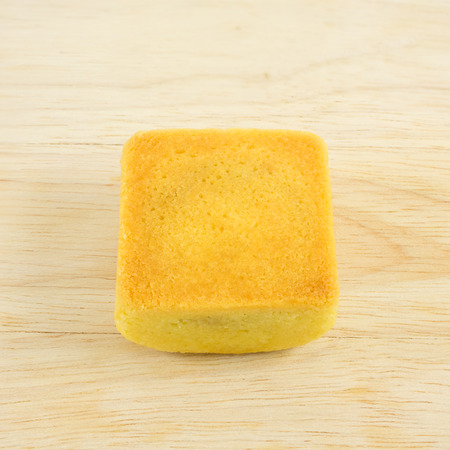 The tasty Taiwanese pineapple pastry cake on the wooden plank.の写真素材