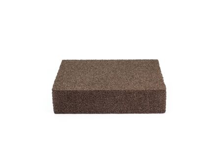 The close up of polishing sandpaper rough sponge block for kitchenware cleaning.の写真素材