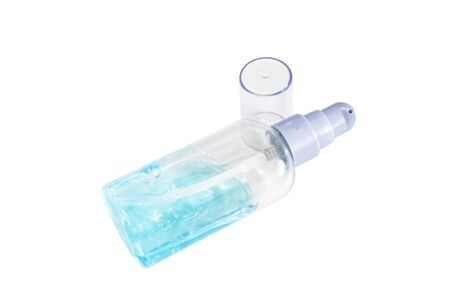 The close up of alcohol gel in small transparent plastic bottle on white background.の写真素材