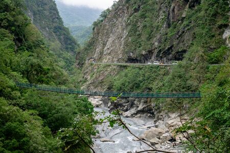 The view of green bridge and river at Taroko national park (Taroko gorge scenic area) in Taiwan.の写真素材