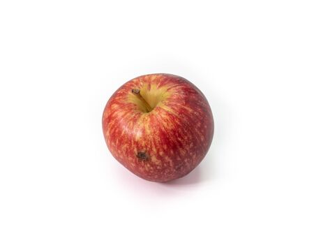 The close up of fresh organic red apple isolated on white  background.の写真素材