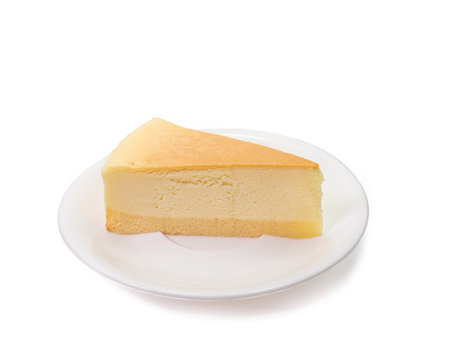 The close up of sliced yummy cheesecake bakery sweet dessert isolated on white background.の写真素材