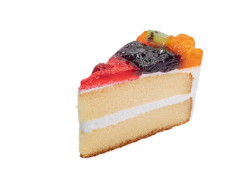 Mixed fruit cake, a close up of homemade fruitcake bakery with kiwi, orange, blueberry and strawberry topping isolated on white background.の写真素材