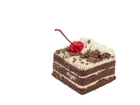 Chocolate cake, a close up of homemade slided birthday layer cake bakery isolated on white background.の写真素材
