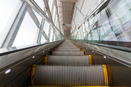 Blurry modern escalator looking upwardの写真素材