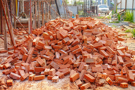Pile of Red Clay Bricks for Construction