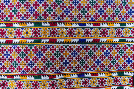 Hand-embroidered Yao Mien embroidery textile with colorful patterns, traditional tribal textile...