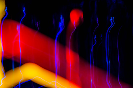 Abstract light painting. Colorful abstract background with bokeh defocused lights.の写真素材